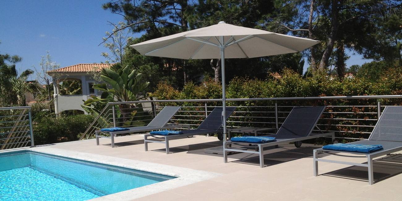 Poolside at our Vila Sol holiday villa for 8